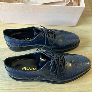 Prada women’s navy oxfords